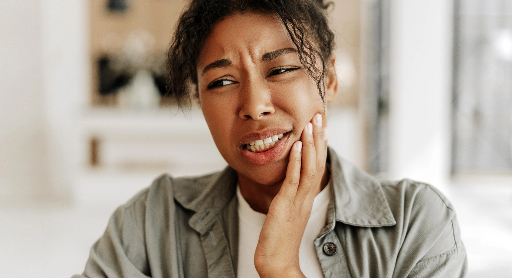 Dr Choonara examining patient for TMJ pain